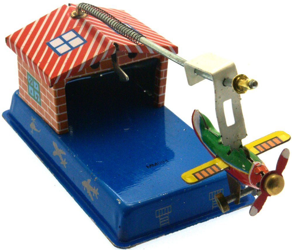 Aeroplane hangar tin toy